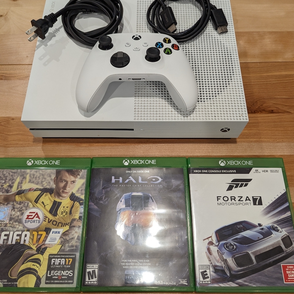 Xbox One S and Xbox Series S with assorted games